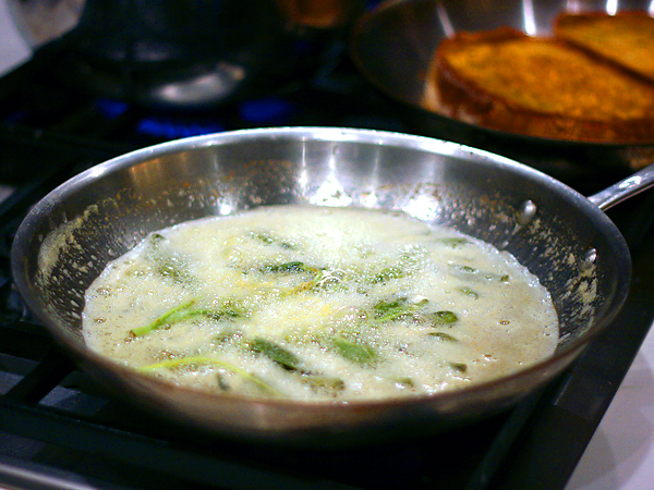 butter and fresh sage in pan, foaming