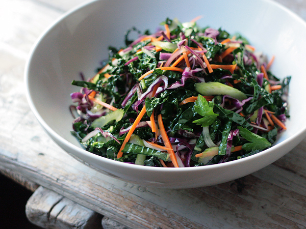 Kaleslaw, up close Kale Slaw in white bowl