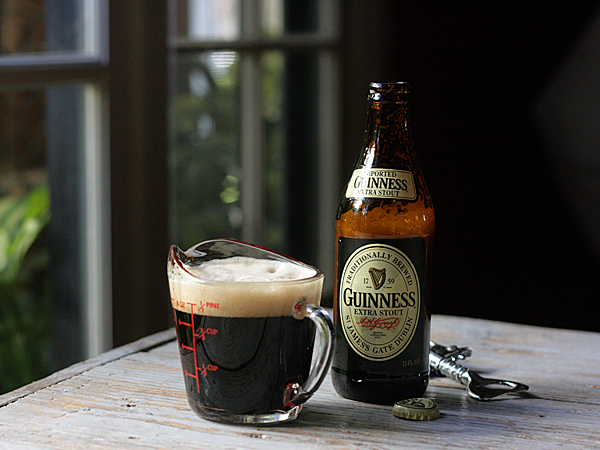 Guinness stout beer bottle, measuring cup