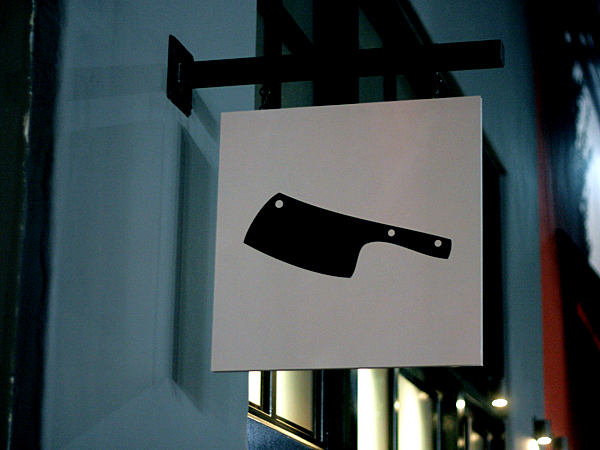 spacca restaurant - cleaver sign
