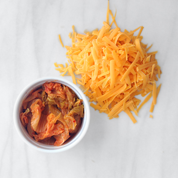 kimchi + grated cheddar cheese for ramen grilled cheese