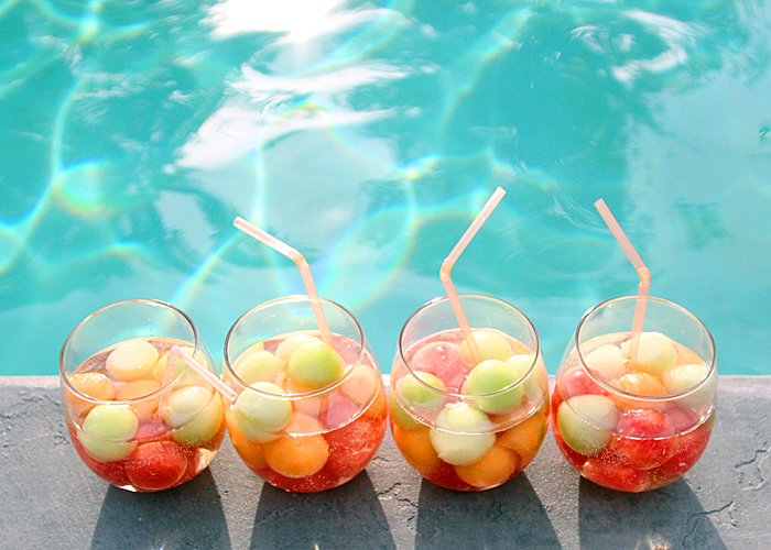 summer sangria with cantaloupe, honeydew and watermelon