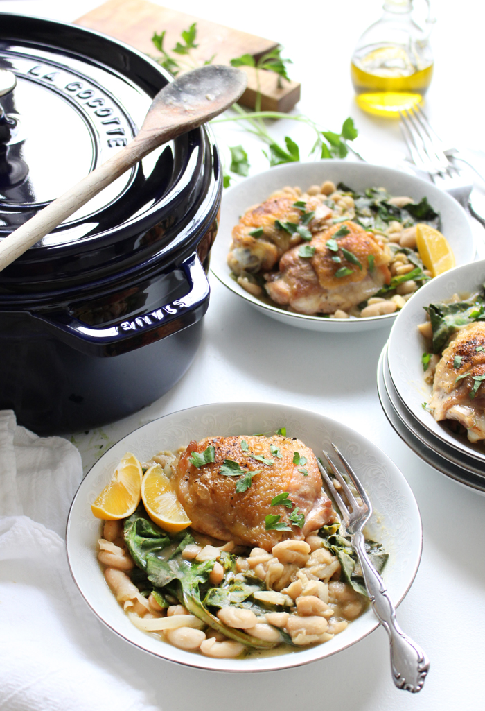crispy braised chicken thighs with beans and greens