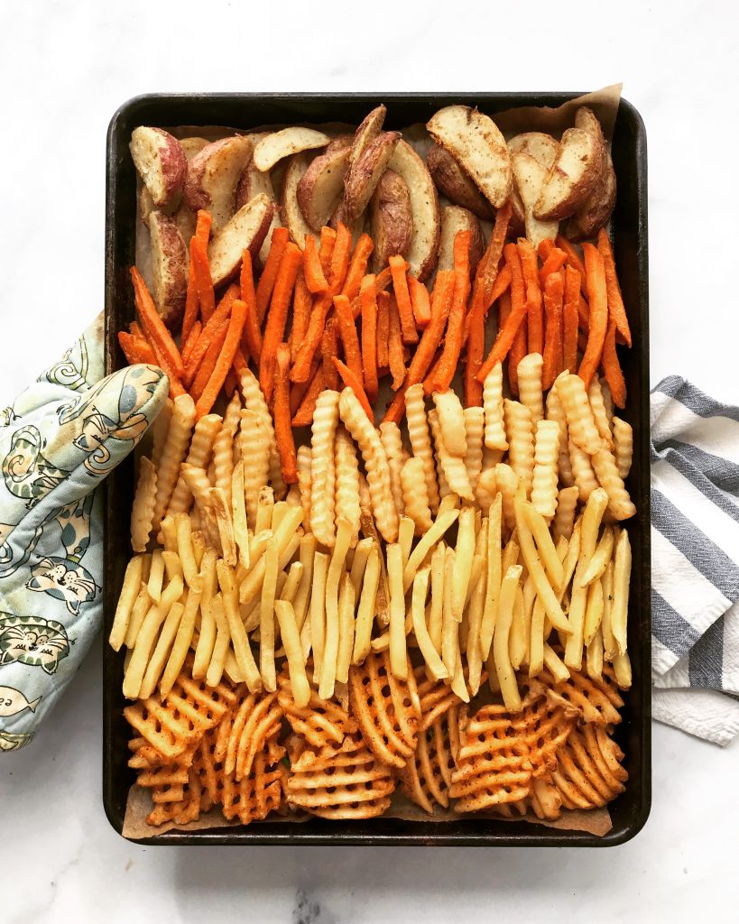 frozen fries on baking sheet