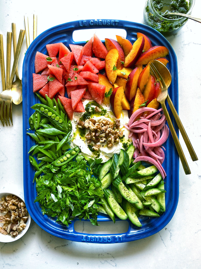 whipped feta with vegetable crudites and fruit, close up