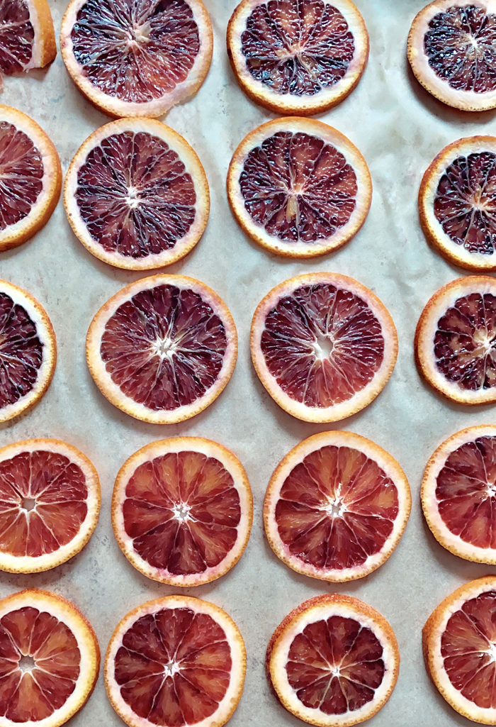 blood orange slices on baking sheet
