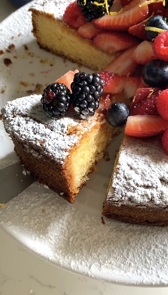 lemon olive oil cake with fresh berries, slice