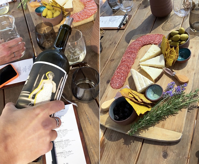pouring chardonnay into glass on patio table at outdoor wine tasting, cheese board at outdoor wine tasting in paso robles